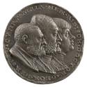 Silver medal of jugate portraits of three men, each wearing shirts with ornamented collars and …