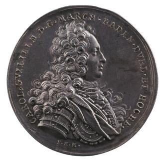 Silver medal of a man wearing a wig, armor, and a sash