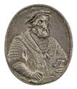 Silver medal of a man wearing a cap and a collar of the Order of the Golden Fleece, holding glo…