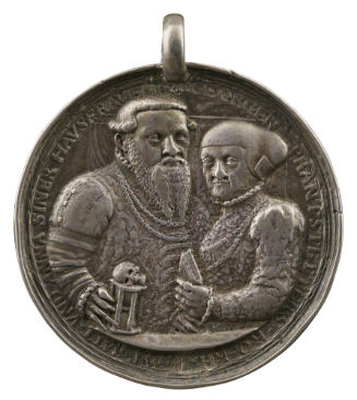 Silver medal of a man holding an hourglass surmounted by skull and a woman holding a book with …