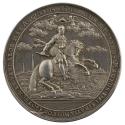 Silver medal depicting a man holding a baton on horseback and moving to the right and turning t…