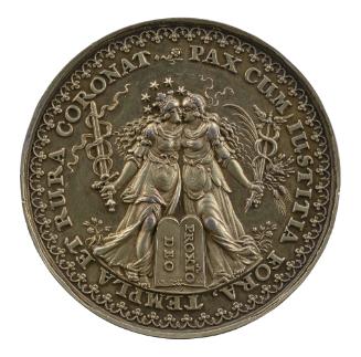 Silver medal depicting the figure of Justice on the left kissing the figure of Peace on the rig…