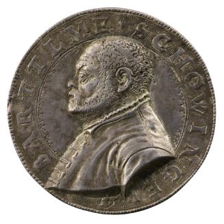 Silver medal of a man in profile to the left