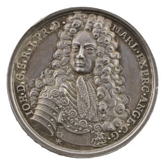 Silver medal of man wearing armor and wig