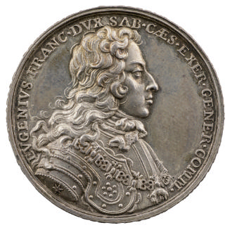 Silver medal of a man wearing a wig, a lace cravat, and the Order of the Golden Fleece