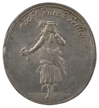 Silver medal of a man wearing a wide hat with a plume and holding glasses in his right hand and…