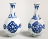 Pair of blue and white porcelain bottle shaped vases.