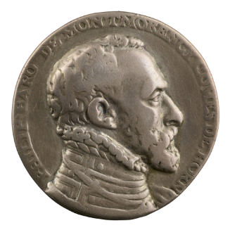 Medal of man in profile to the right