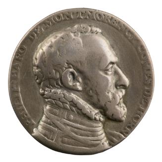 Medal of man in profile to the right