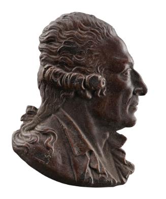 Wax profile of a man in profile to the right