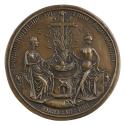 Bronze medal of the Fountain of Life flanked by two female figures, one old and fully clothed, …