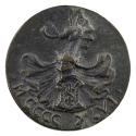 Bronze medal of a shield with an “S” on it, surmounted by a helmet surrounded by drapery, with …
