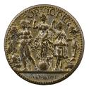 Bronze medal of three figures. On the left, a nude muscular man stands in contrapposto, on the …