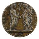 Bronze medal of two figures shaking hands. The male figure on the left, holds a winged staff su…