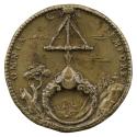 Bronze medal of a ring, in a landscape, surmounted by a triangle divided in half by an arrow po…