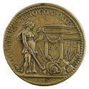 Bronze medal of Peace, represented as a woman wearing a transparent classical gown, holding a c…