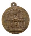 Bronze medal of the façade of a Roman church