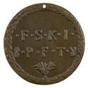 Bronze medal of the letters F S K I P F T Y inside a wreath border