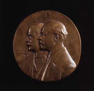 Medal with bust of two men in profile, facing to the left