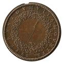 Bronze medal of a laurel wreath framing a flying rocket; pearled border