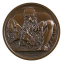 Bronze medal of a mountain in the shape of a nude, crouching man, with a long beard and his han…