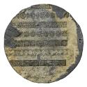 Lead reverse of a medal covered in patterned paper with seven horizontal bands of repeated flor…