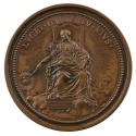 Bronze medal depicting a woman sitting on a throne above the clouds, wearing loose robes with a…