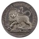 Silver medal depicting a lion with two tails and a crown standing on various broken elements of…