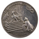 Silver medal depicting a crowned male on a throne offering a scepter wrapped in laurel to a kne…