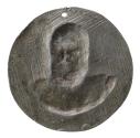 Backside of a lead medal