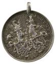 Silver medal depicting two heraldic shields surmounted by helmets