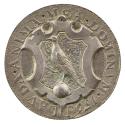 Silver medal of a coat of arms with a bird