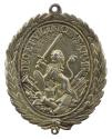 Silver medal depicting a lion carrying a sword and a round, pointy shield standing on weapons a…