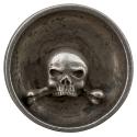 Silver medal depicting a skull and bones