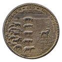 Silver medal depicting a dog walking before a flock of sheep