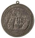 Silver medal of a naval battle with a ship sinking in flames on the right