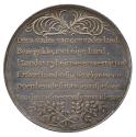 Silver medal of a pair of entwined palm branches above, and another pair of entwined leafy laur…