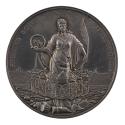 Silver medal depicting a laurel-crowned female figure representing Peace stands on a pile of im…