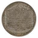 Silver medal with a Dutch inscription framed by swags of flowers and fruit