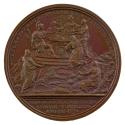 Bronze medal depicting four figures gathered around a table on a raised platform while a shephe…