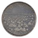 Silver medal depicting a battle scene with many ships, some sinking