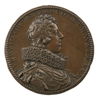 Bronze portrait medal of Louis XIII, King of France wearing armor, a ruff, and a sash