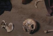 Close up of skull and bones on the ground in front of the figures in the oil painting