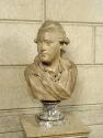 Terracotta bust of Peter Adolf Hall. He looks over to his right, and has a short wig on, parted…