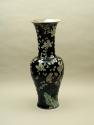 Black ground porcelain vase with branches and white flowers