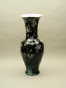 Alternate view of black ground porcelain vase with branches and white flowers