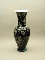 Alternate view of black ground porcelain vase with branches and white flowers