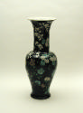 Alternate view of black ground porcelain vase with yellow, white, and pink  flowers