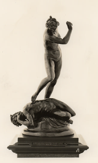 A bronze sculpture of Virtue overcoming Vice.  Virtue is standing upright, her right arm is lif…