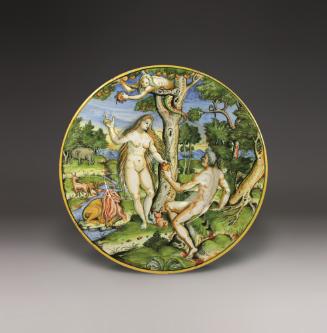 Circular plate showing a biblical scene in a garden, in color